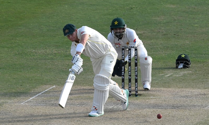 Australia's Steven Smith plays a shot during the fourth day play of the first Test cricket match between Pakistan and Australia at the Rawalpindi Cricket Stadium. — AFP
