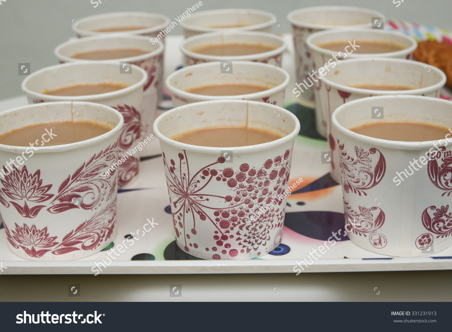 stock-photo-many-rows-of-paper-cups-with-tea-milk-indian-masala-chai-tea-refreshing-indian-blend-of-black-tea-331231913.jpg