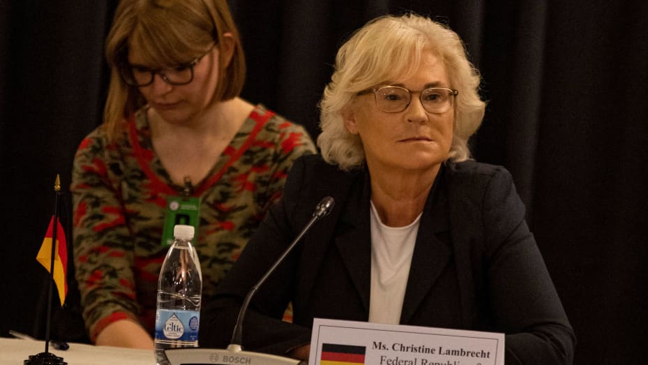 German Defense Minister Christine Lambrecht (R) attends a meeting with members of a Ukraine Security Consultative Group at the U.S. Air Base in Ramstein, western Germany, on April 26, 2022.