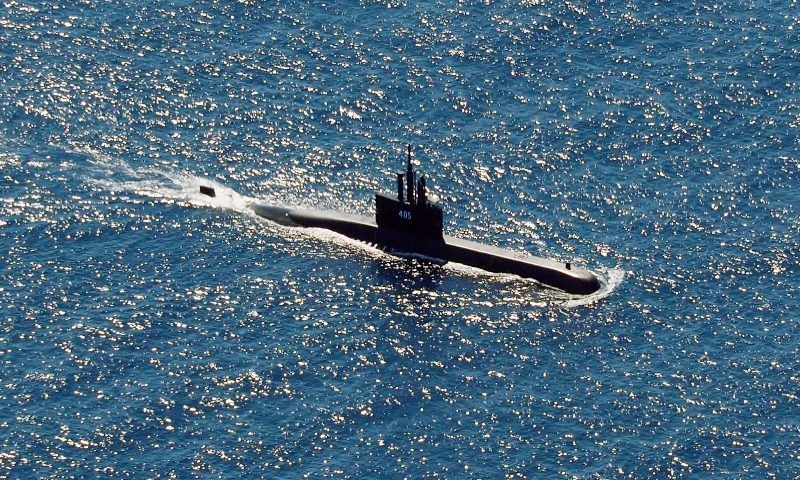 In this aerial photo taken from a maritime patrol aircraft of 800 Air Squadron of the 2nd Air Wing of Naval Aviation Centre (PUSPENERBAL), the Indonesian Navy submarine KRI Alugoro sails during a search for KRI Nanggala, another submarine that went missing while participating in a training exercise on Wednesday, in the waters off Bali Island, Indonesia, Thursday. — AP