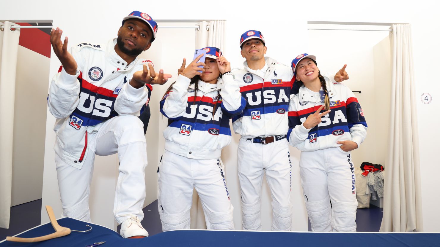 The US breaking team -- from left, Jeffrey Louis, Logan Edra, Victor Montalvo and Grace Choi -- try on Team USA uniforms on July 21, 2024, in Paris.