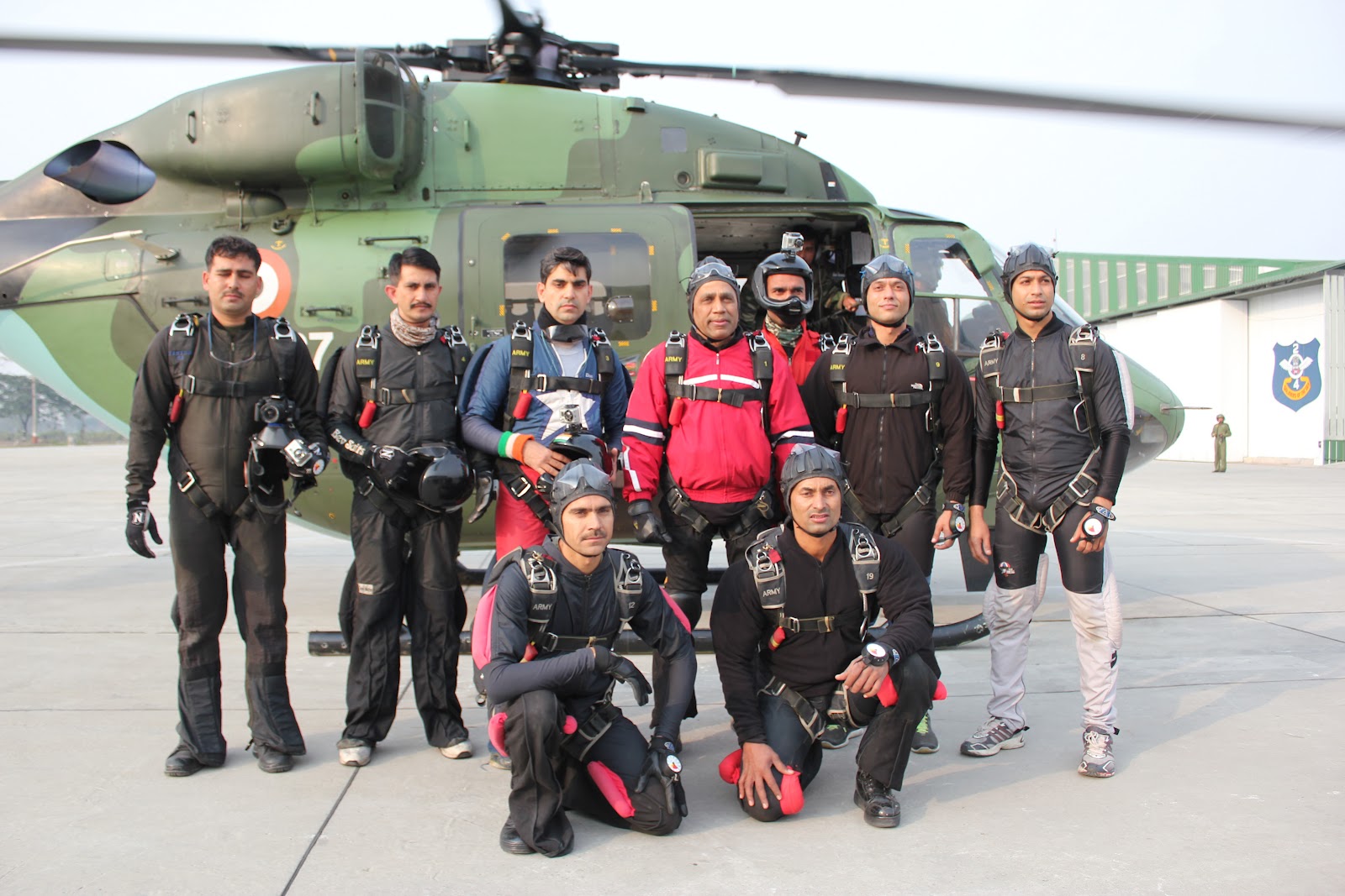 Lt+Gen+Ramesh+Halgali,+DCOAS+%28in+red+jacket%29+before+boarding+helicopter+for+freefall+jump.JPG
