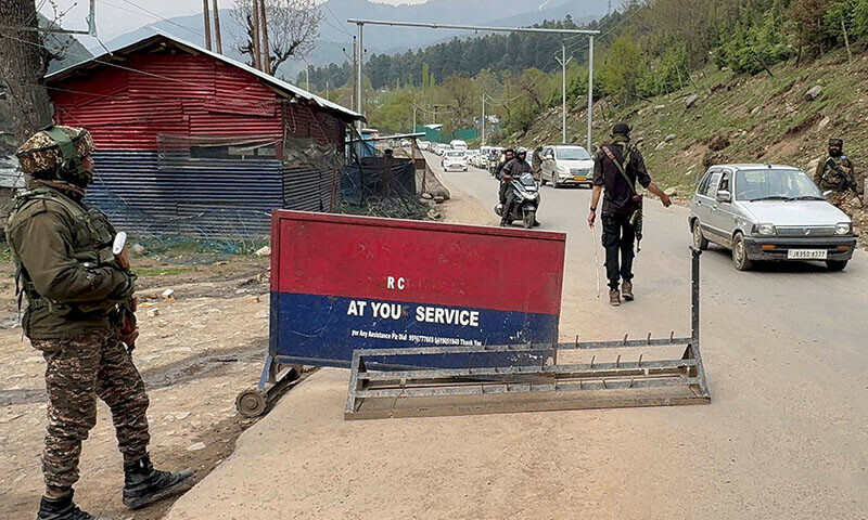 Indian police officers stop vehicles at a check point following a suspected gunmen attack, near Pahalgam in south Kashmir’s Anantnag district, on April 22. — Reuters