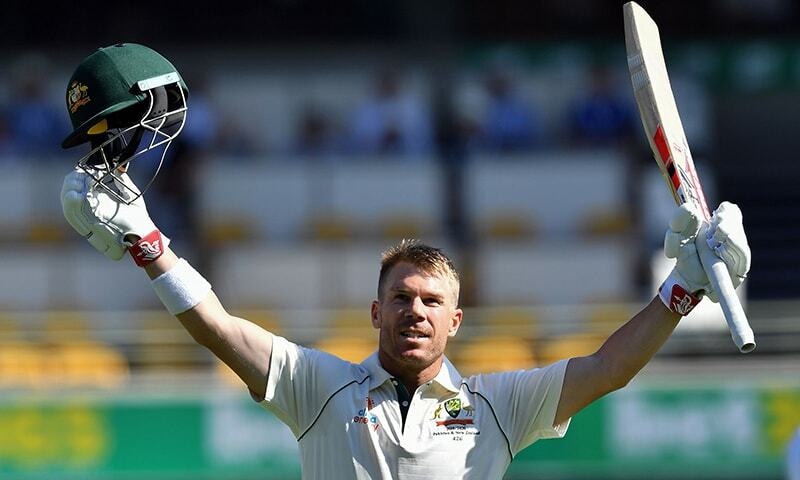 This file photo shows Australia's batsman David Warner celebrating after reaching his century on day two of the first Test match between Pakistan and Australia at the Gabba in Brisbane on November 22, 2019. — AFP/File