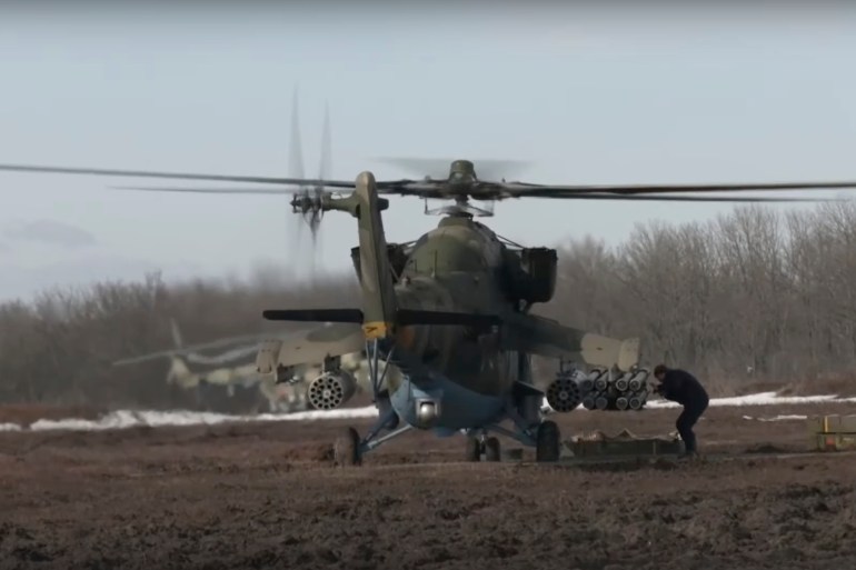 A handout still image taken from handout video made available by the Russian Defence ministry press-service shows the attack helicopters Mi-24 prepare for battles in Ukraine on the field, Russia, 28 February 2022