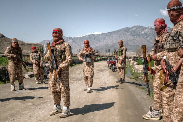 Members of a Taliban Red Unit in Laghman Province, Afghanistan, in March. The sneakers they wear have become synonymous with violence.