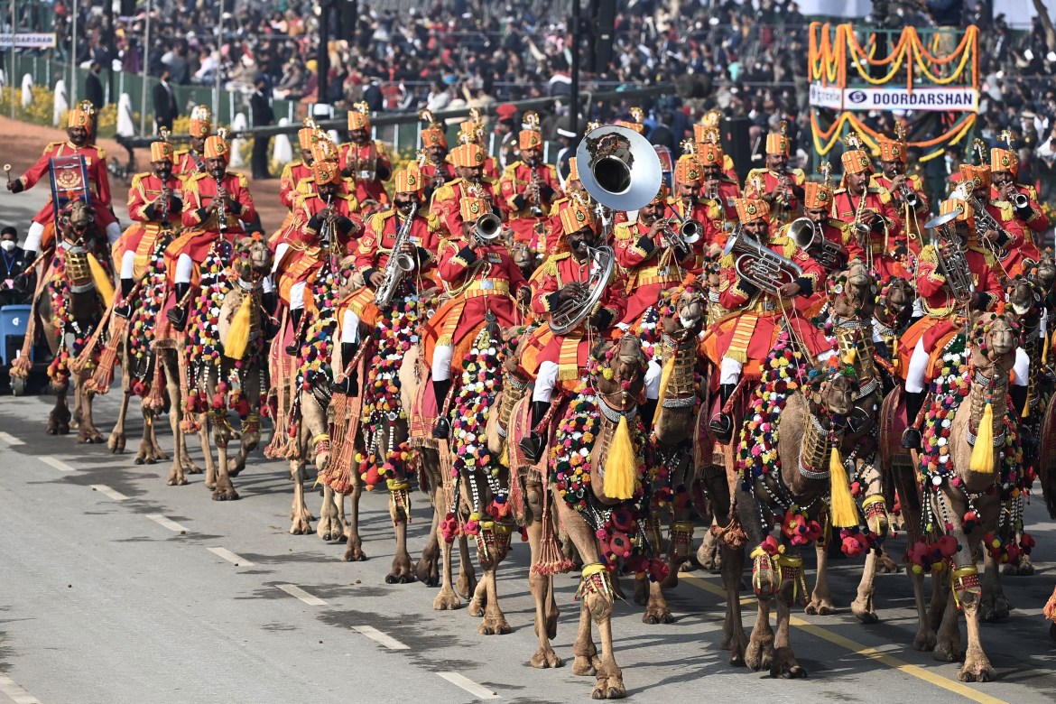Border Security Force soldiers on camels they march along Rajpath during the Republic Day parade in New Delhi. [Jewel Samad/AFP]