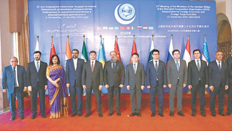 ISLAMABAD: A group photo of the participants of the meeting of ministers from member states of the SCO.—APP