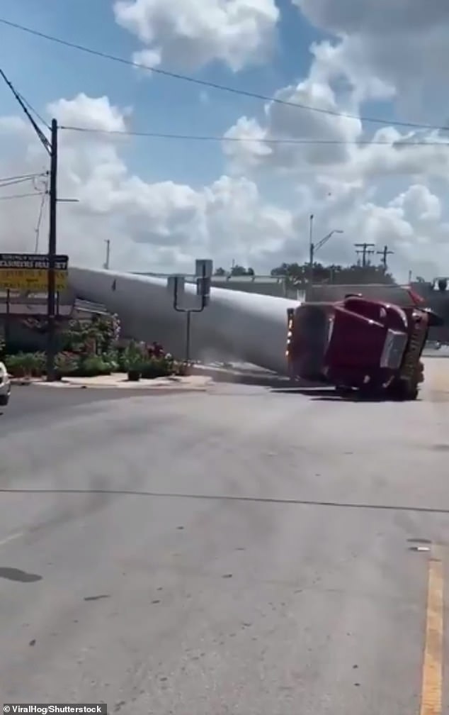 The train dragged the vehicle onto its side to the shock and awe of surrounding witnesses