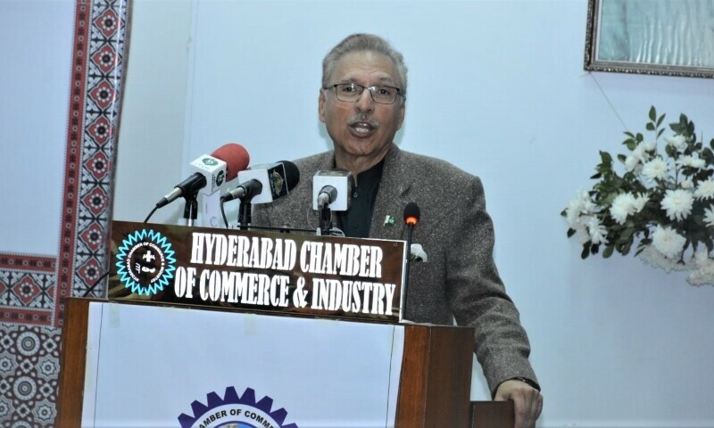 <p>President Dr Arif Alvi addresses the business community leaders during a conference in Hyderabad on February 18, 2023. — Photo by Umair Ali</p>