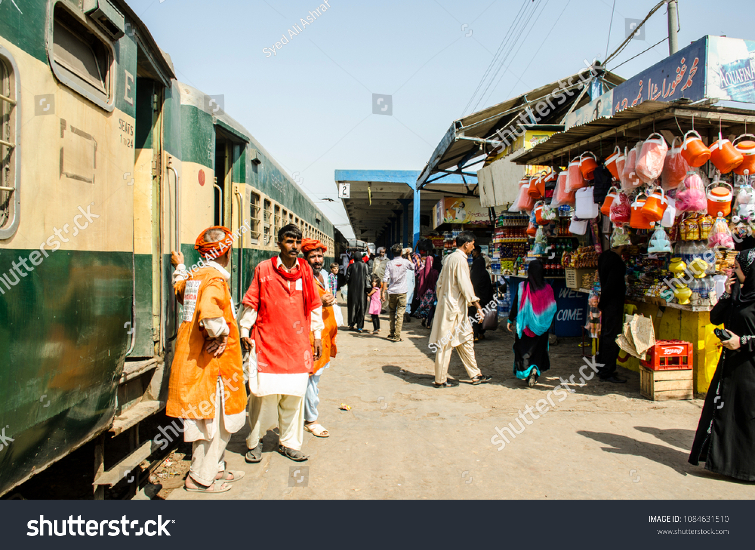 stock-photo-cantt-station-karachi-pakistan-october-porter-koli-at-the-karachi-cantt-railway-1084631510.jpg