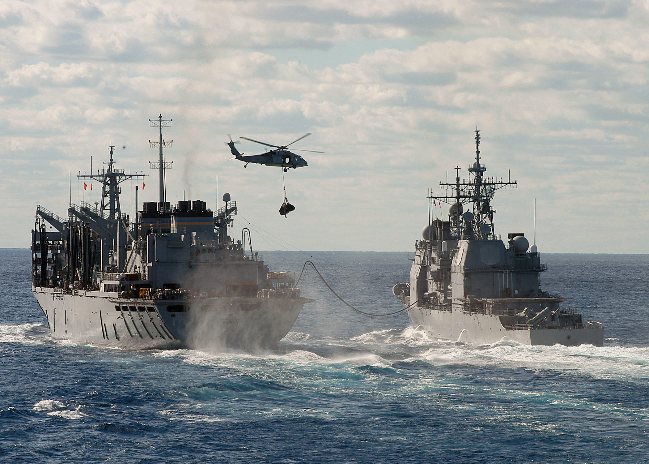 US_Navy_031121-N-8213G-002_The_Military_Sealift_Command_ship_USNS_Supply_%28T-AOE_6%29_conducts_a_refueling_at_sea_and_vertical_replenishment_at_sea.jpg
