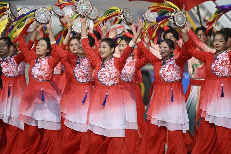 Performers dance as Argentina&apos;s President Alberto Fernandez arrives at Beijing&apos;s airport ahead of the Belt and Road Forum, October 2023