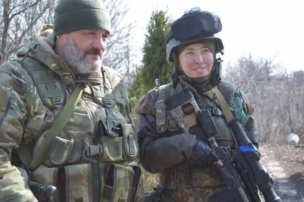 Ukrainian sniper Olena Bilzerska with her husband Valeriy Voronov, a retired soldier