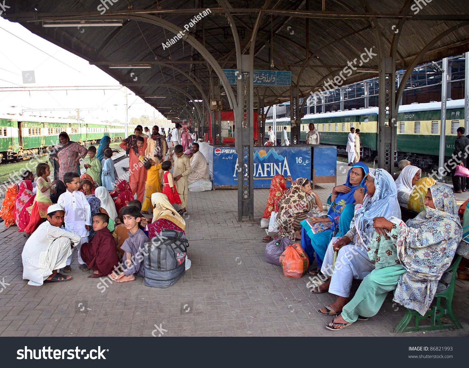 stock-photo-lahore-pakistan-oct-unidentified-passengers-seen-worried-at-lahore-railway-station-due-to-86821993.jpg