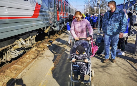 Civilians evacuated from the Donbas region arrive in Rostov, Russia, on Monday