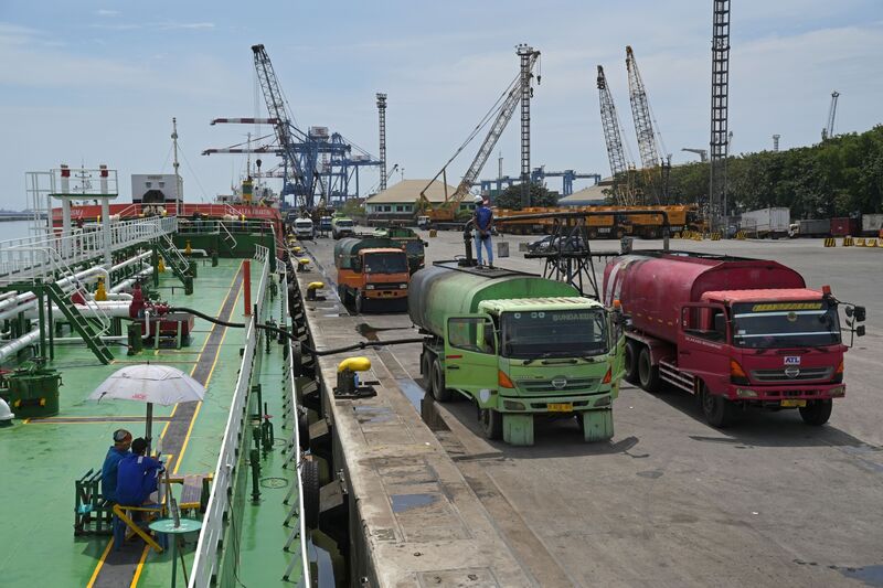 Palm oil loaded into trucks from a tanker docked at Tanjung Priok Port in Jakarta in April.