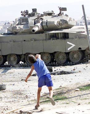 palestinian-kid-throw-stone-israeli-tank-1%5B1%5D.jpg