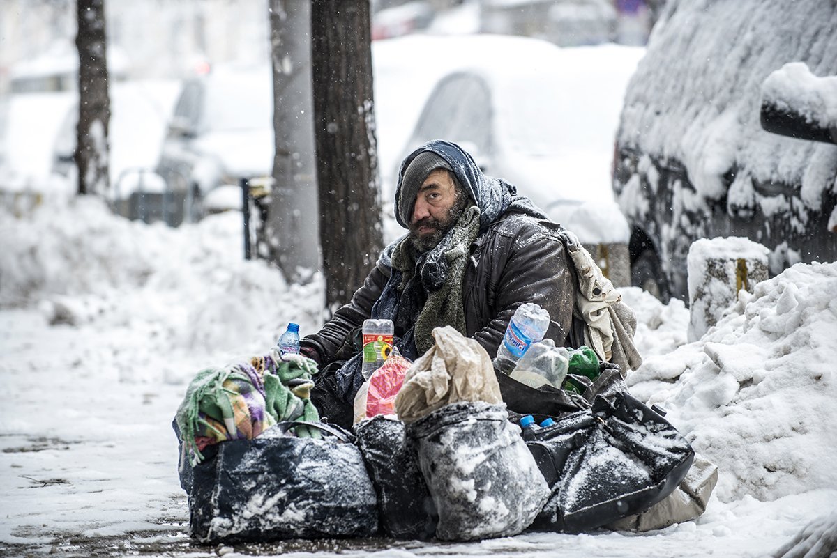 cold_homeless_man_snow.jpg