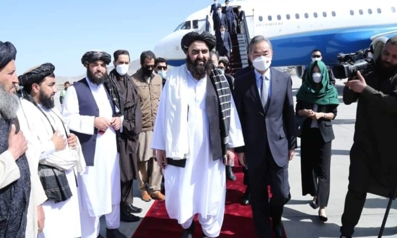 Afghanistan's acting Foreign Minister Amir Khan Muttaqi (L) welcomes Chinese Foreign Minister Wang Yi (R) on his arrival to Kabul, Afghanistan, Thursday. — Photo courtesy Bakhtar News Agency