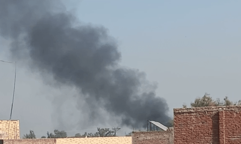 <p>This image shows smoke rising in the distance after security forces launched an operation on the a CTD centre in Bannu. — DawnNewsTV</p>
