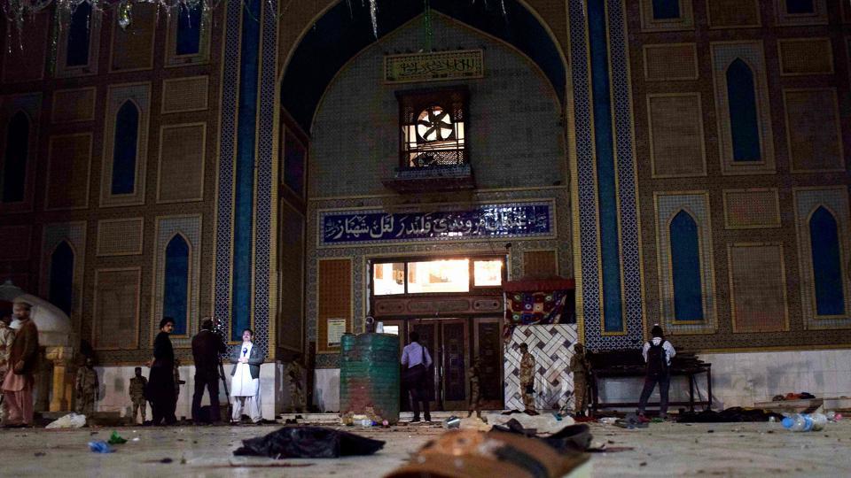 topshot-pakistan-unrest-bombings-shrine_c51766c6-f5db-11e6-800c-c780129a337a.jpg