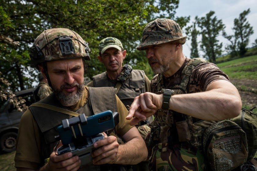 Ukrainian servicemen train using commercial drones in a military capacity