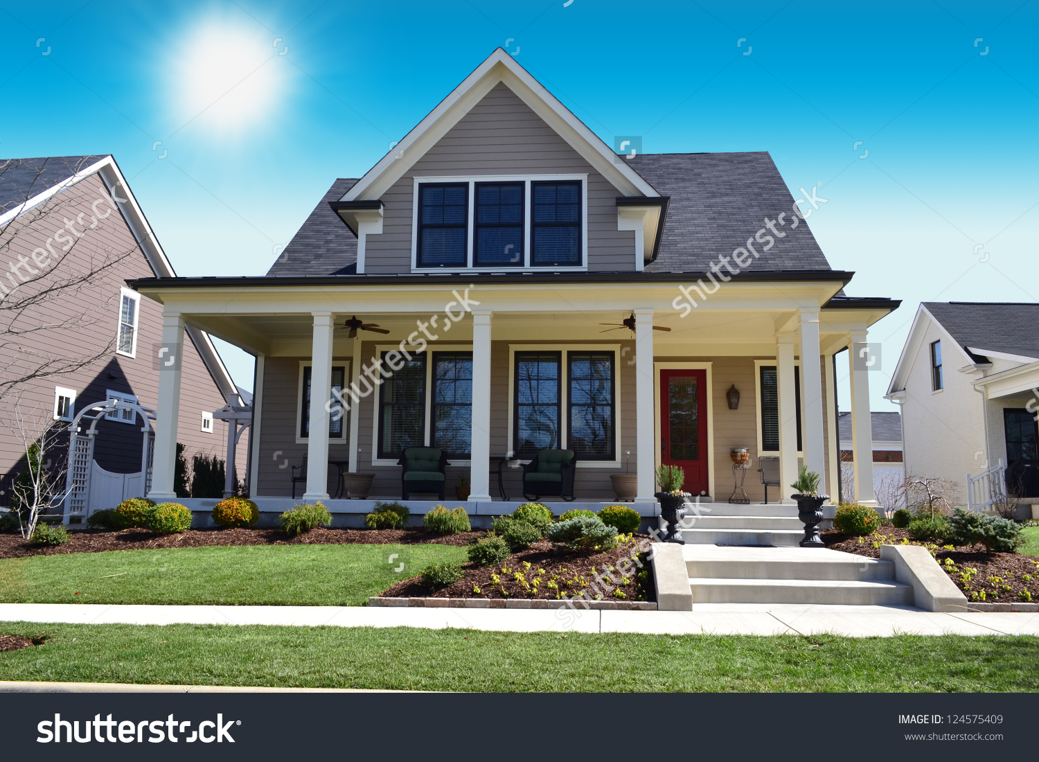 stock-photo-beige-new-england-style-suburban-dream-home-124575409.jpg