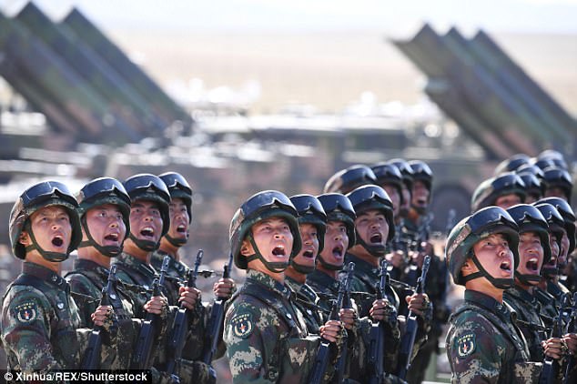 42D1ACEB00000578-0-A_formation_soldiers_from_the_PLA_s_Rocket_Force_which_controls_-a-15_1501880058369.jpg