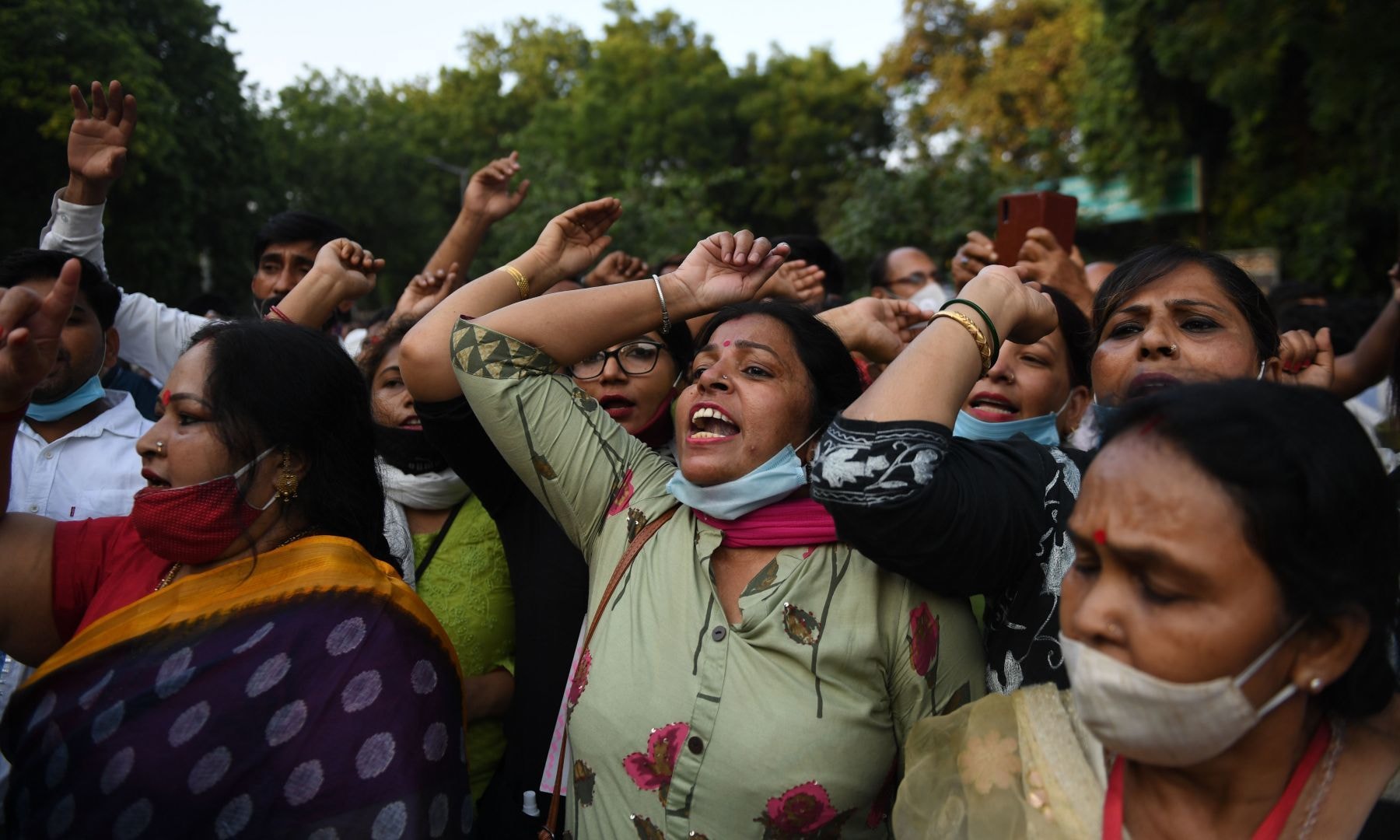 Women shout slogans during a protest against the gang-rape of a woman in New Delhi on October 2. — AFP