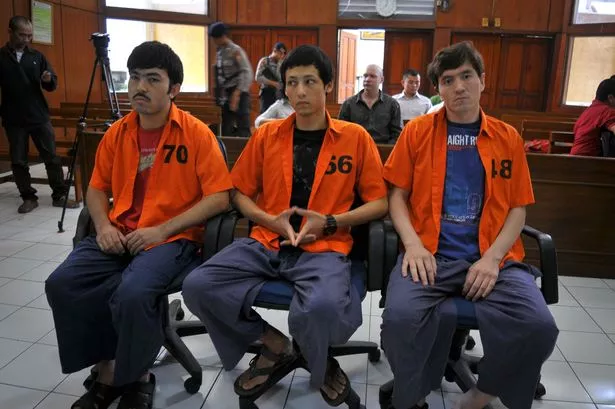 Three members of China's Uyghur minority found guilty of terror charges in a Indonesian court