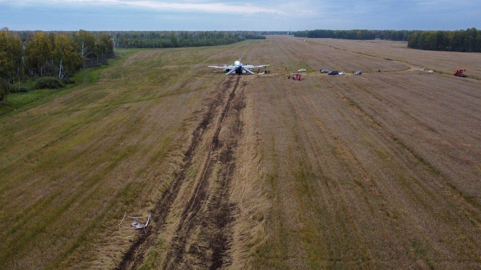 Ural Airlines plane cuts trenches into the field from its landing