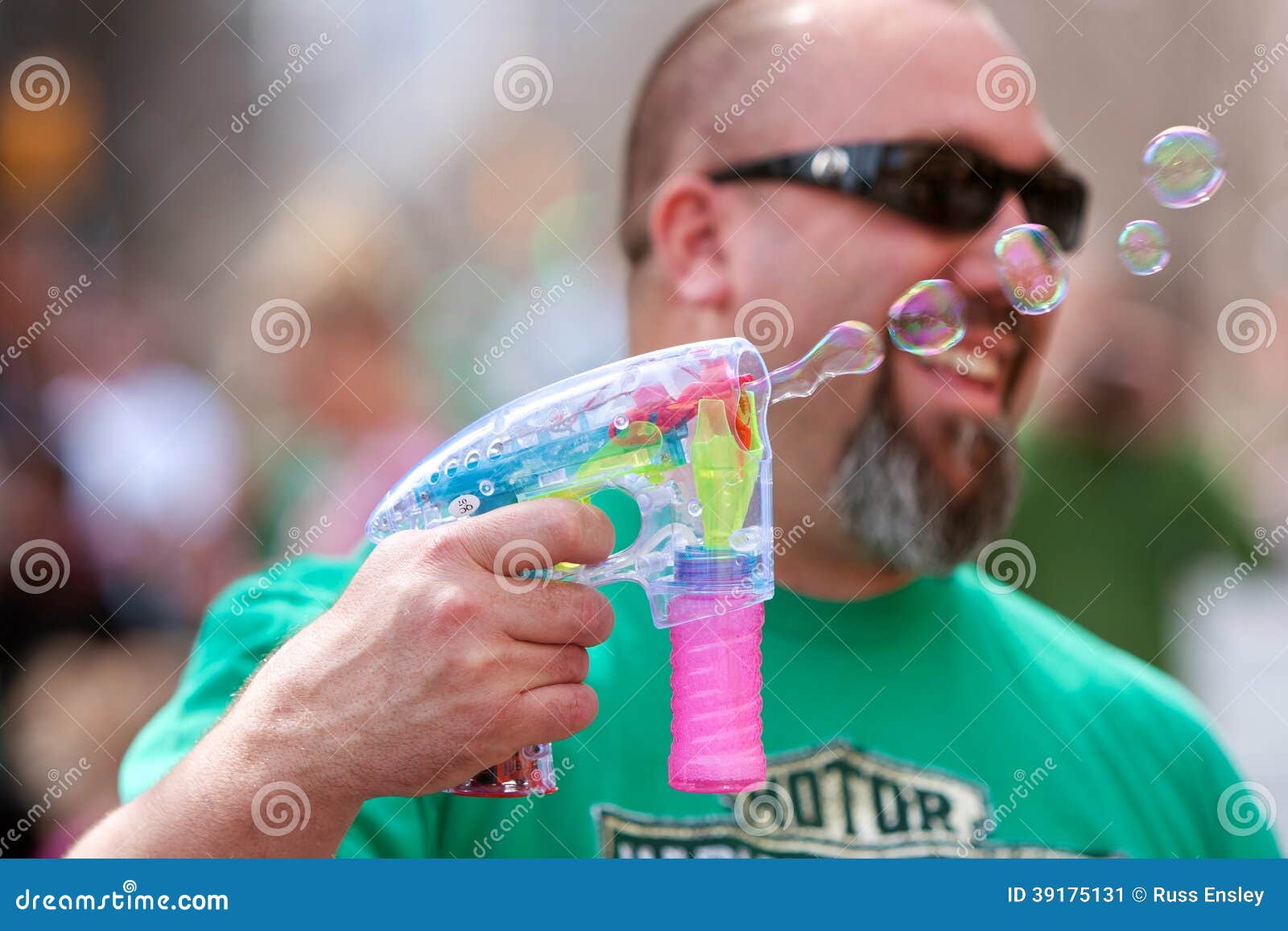 smiling-man-blows-bubbles-bubble-gun-atlanta-ga-usa-march-uses-to-blow-st-patrick-s-day-parade-peachtree-street-39175131.jpg