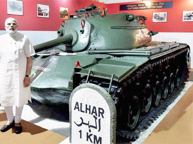 pm-modi-poses-infront-of-a-captured-pakistani-tank.jpg