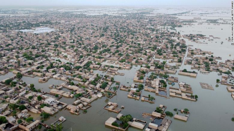 This aerial photograph, taken on September 1, 2022, shows flooded residential areas in the town of Dera Allah Yar town in Jaffarabad district, Balochistan province.