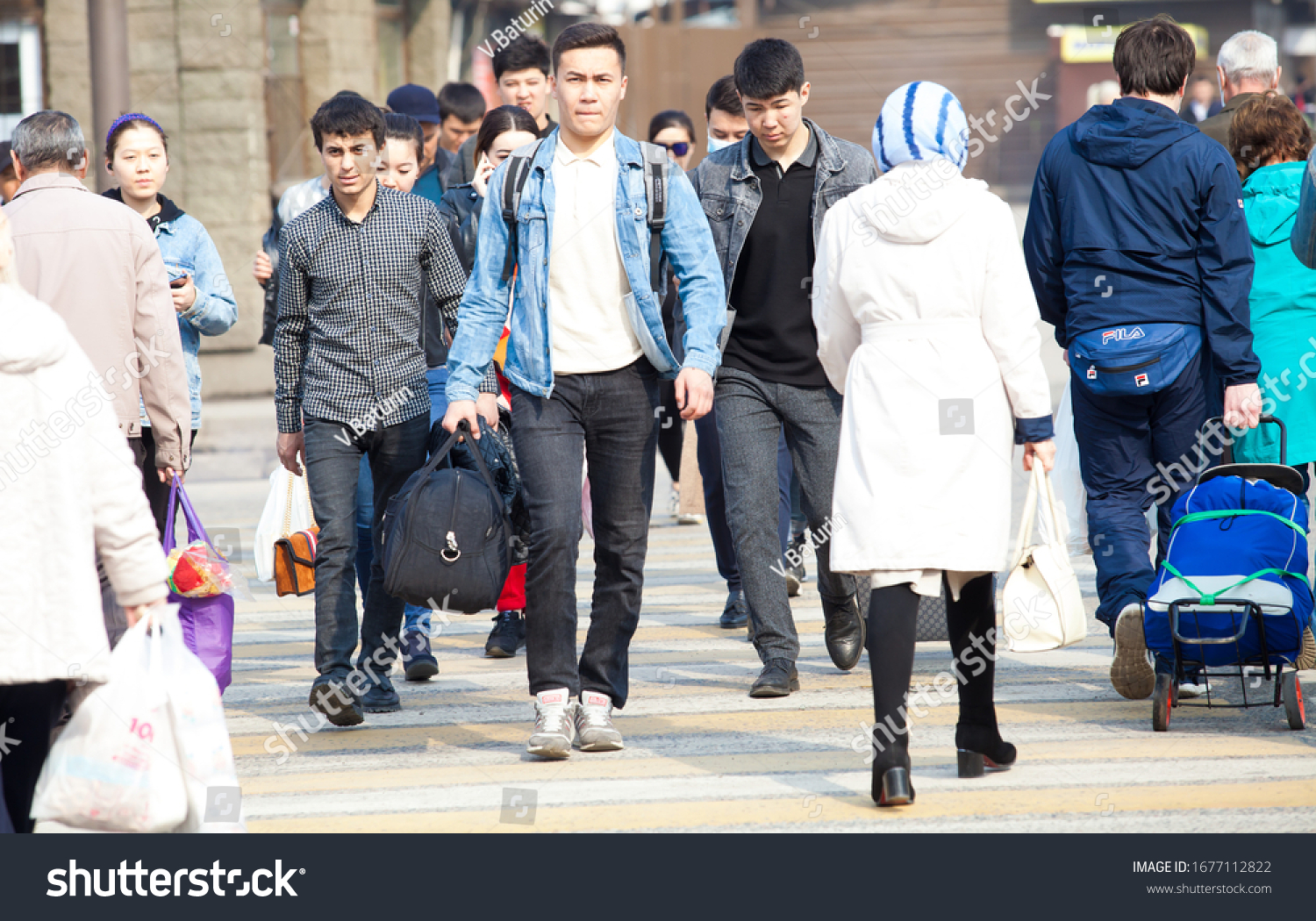 stock-photo-almaty-kazakhstan-asian-people-on-the-crosswalk-in-a-epidemic-situation-in-almaty-1677112822.jpg