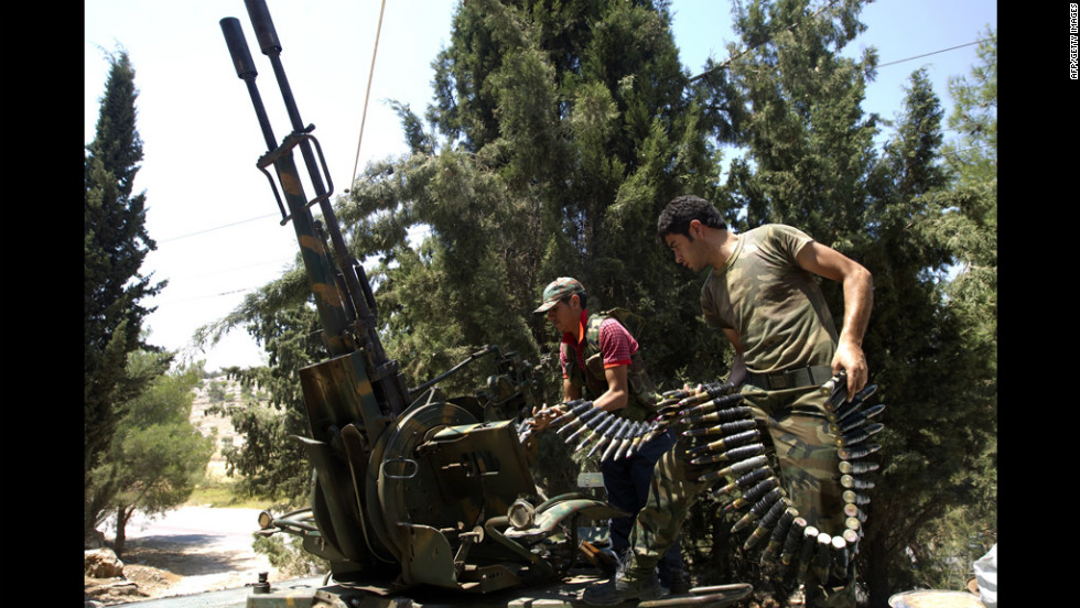 120731010649-syria-02-rebels-machine-gun-horizontal-large-gallery.jpg