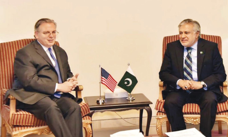 Finance Minister Ishaq Dar in talks with US Ambassador Donald Blome.—PPI