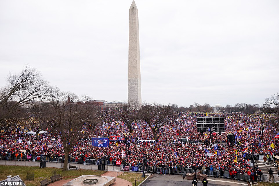 37678474-9118653-Thousands_of_supporters_of_President_Trump_are_seen_above_near_t-a-1_1609950432587.jpg