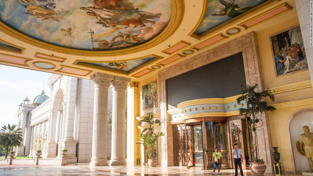 A security guard stands at an entrance to a building in the Kings Romans Casino in this file photograph from 2017