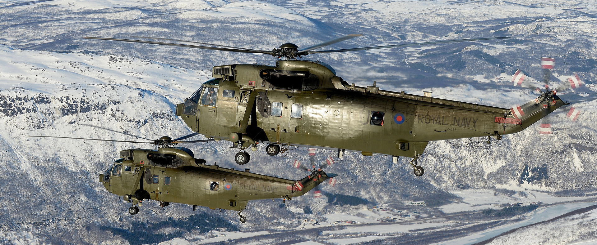 1920px-Royal_Navy_Seaking_Mk4_Helicopters_Over_Northern_Norway_MOD_45156767.jpg
