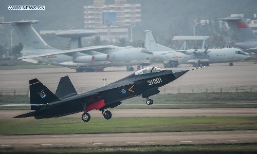A Chinese FC-31 stealth fighter has its test flight ahead of the 10th China International Aviation and Aerospace Exhibition in Zhuhai, South China's Guangdong Province, Nov 10, 2014. Photo: Xinhua 