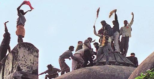 Babri+Masjid+demolition+in+Ayodhya+on+December+6+1992+Kar+Sewaks+on+mosque's+domes.JPG