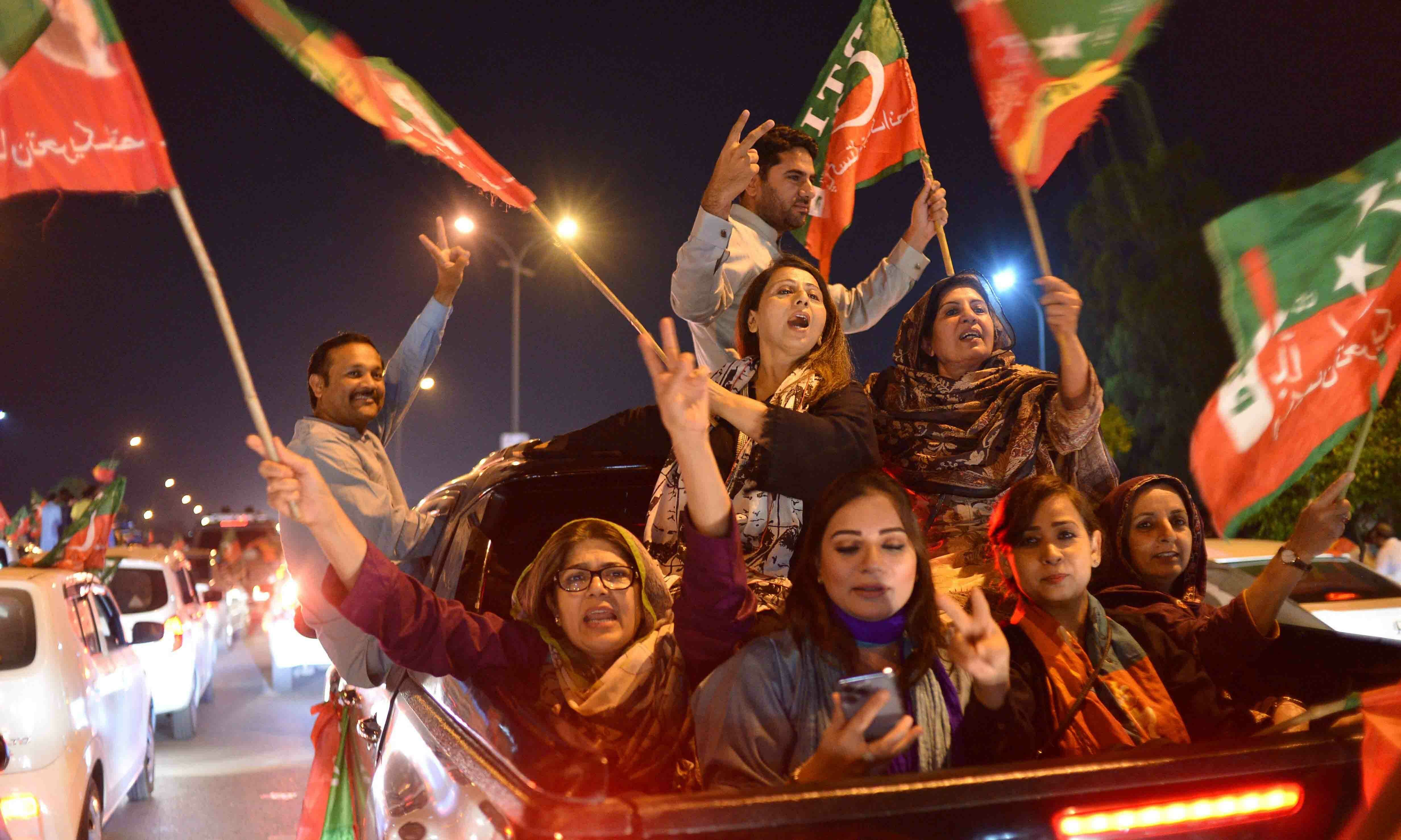 PTI supporters take part in a rally in support of former prime minister Imran Khan in Islamabad on April 10. — AFP