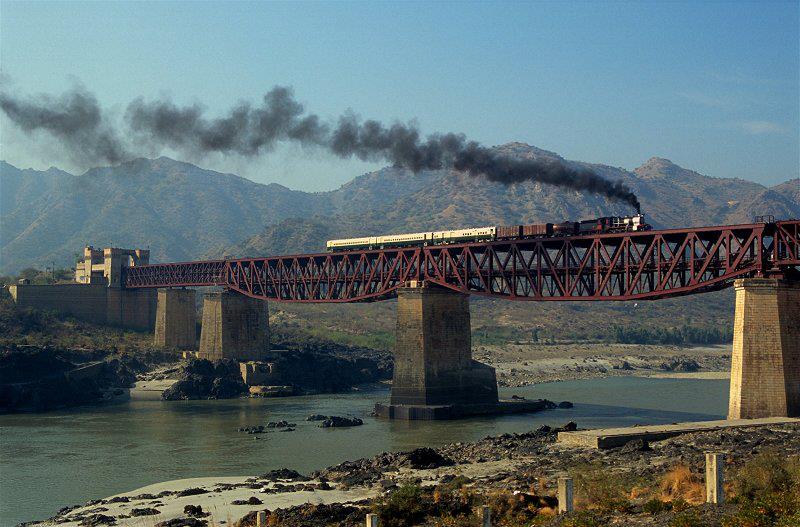 A-vintage-steam-locomotive-for-tourists-crosses-the-old-Attock-bridge-built-1883-over-the-Indus-Photo-2006.jpg