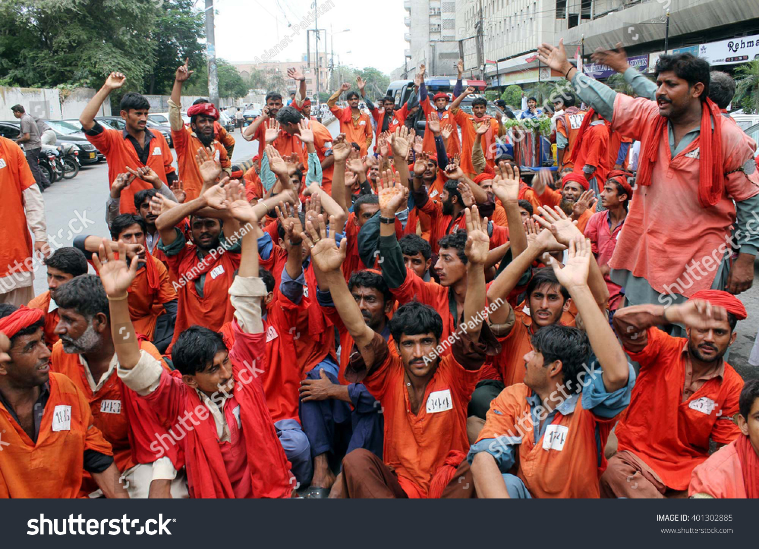 stock-photo-karachi-pakistan-apr-porter-staffs-of-cantt-railway-station-chant-slogans-against-high-401302885.jpg