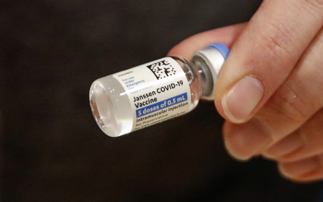 FILE: In this file photo taken on 5 March 2021 registered nurse Florisa N. Lingad holds a Johnson & Johnson Covid-19 vaccine at a vaccination center established at the Hilton Chicago O'Hare Airport Hotel in Chicago, Illinois. Picture: AFP