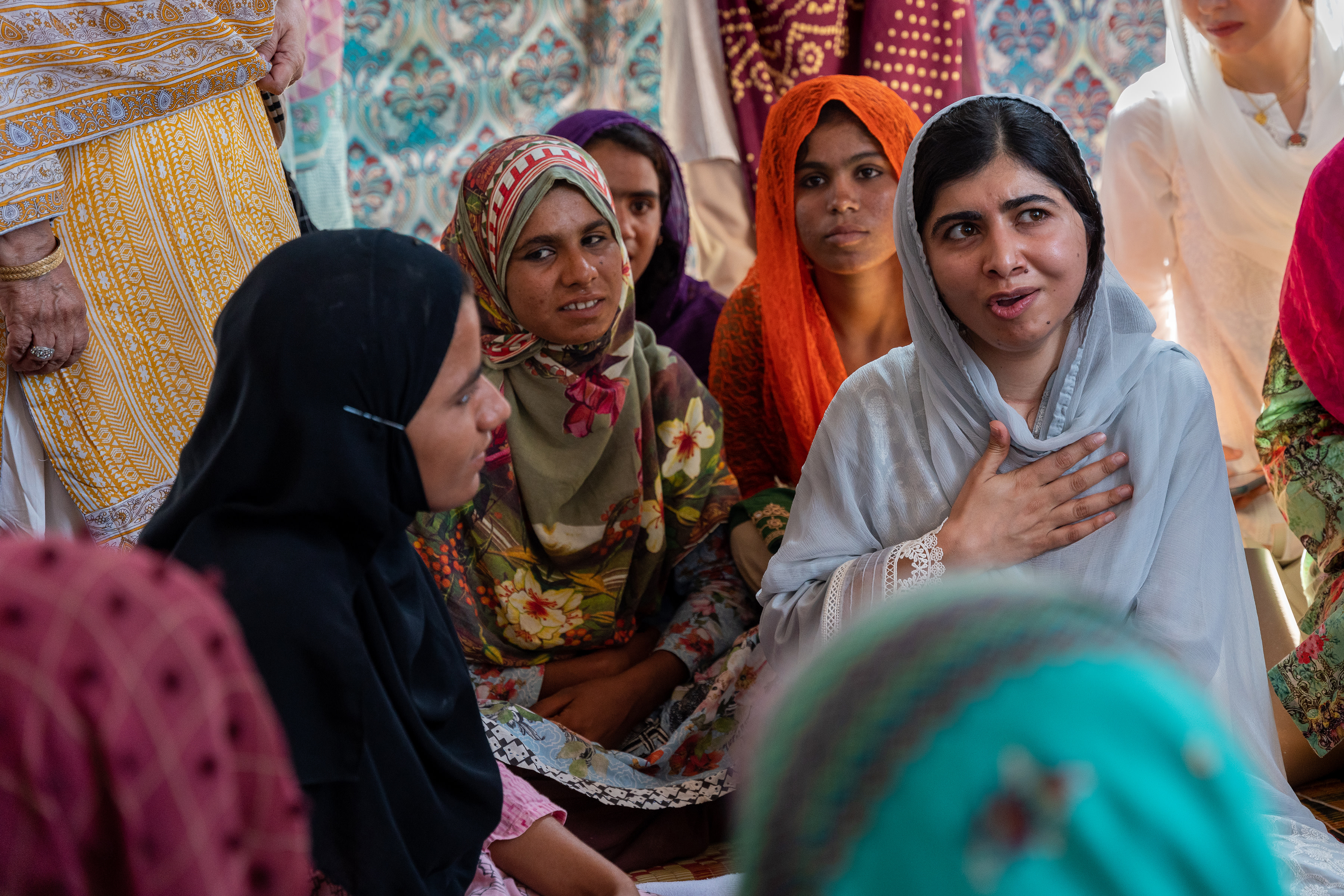 Malala speaking with Sohaila. Credit: Amna Zuberi for Malala Fund