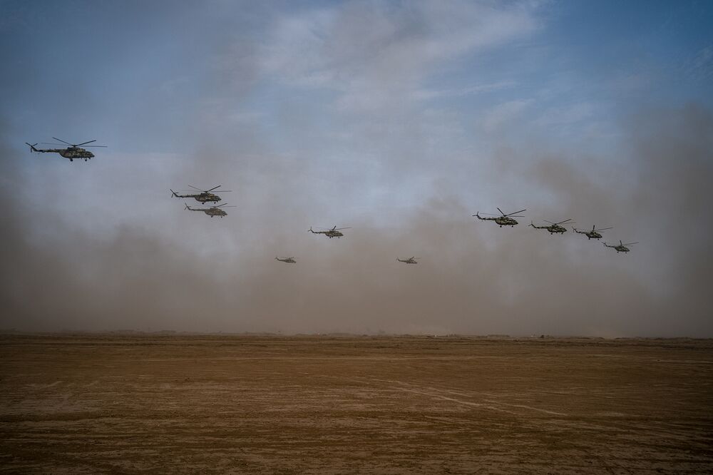 Russian helicopters take part in military exercises at the Kapustin Yar range in Astrakhan region, Southern Russia on Sept. 25.