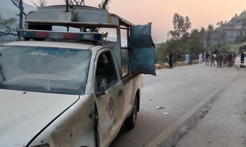 A police vehicle lies damaged after it was caught in an explosion on Malam Jabba Road in Swat on September 21. — Photo via author